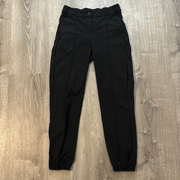 Lululemon Women’s Sz 25 Warpstreme High Rise 7/8 Zip Up Button Black Jogger Pant - Picture 1 of 14
